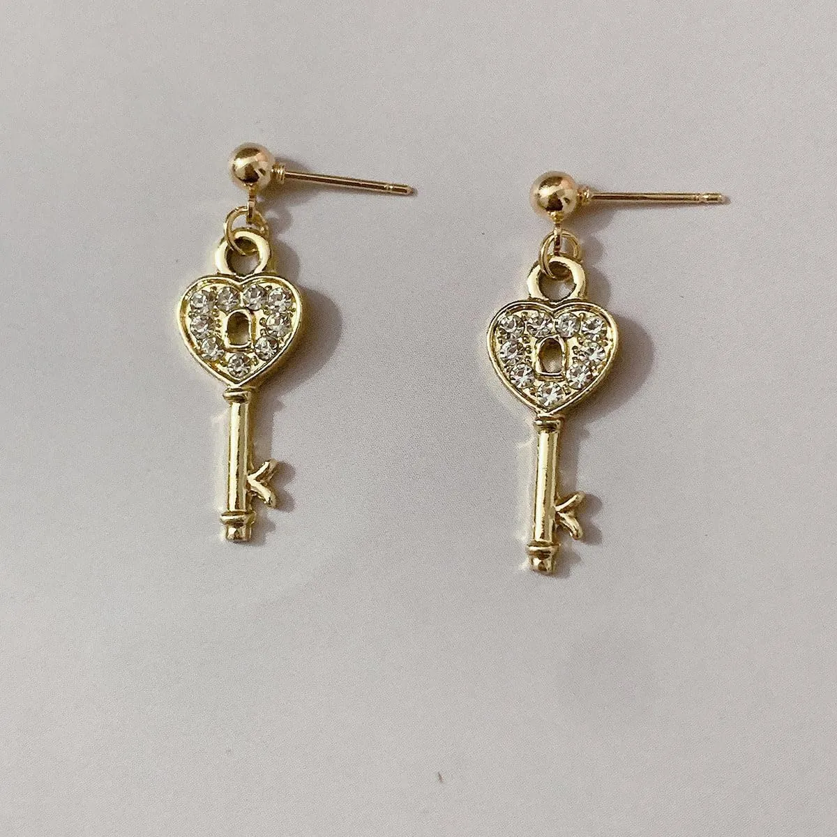 exquisite crystal lock pendant earrings are set with cubic zirconia plated with 14K gold trim designed for women Earrings are for anniversaries birthdays parties jewelry gifts